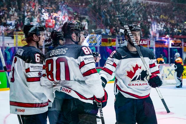 HELSINKI, FINLAND - MAY 13: Travis Sanheim of Canada (L), Pierre-Luc Dubois of Canada and Nicolas Roy of Canada (R) celebrates during the 2022 IIHF Ice hockey, Eishockey World Championship, WM, Weltmeisterschaft match between Germany and Canada at Helsinki Ice Hall on May 13, 2022 in Helsinki, Finland. Helsinki Helsinki Ice Hall Uusimaa Finland Copyright: xJustPictures.ch JarixPestelaccix