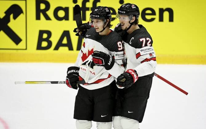 Kent Johnson (left) and Thomas Chabot of Canada celebrate a goal during the 2022 IIHF Ice hockey, Eishockey World Championships preliminary round group A match between Germany and Canada in Helsinki on May 13th, 2022. Helsinki Finland LKLAPA20220513214041Z349  Copyright: xAnttixAimo-Koivistox