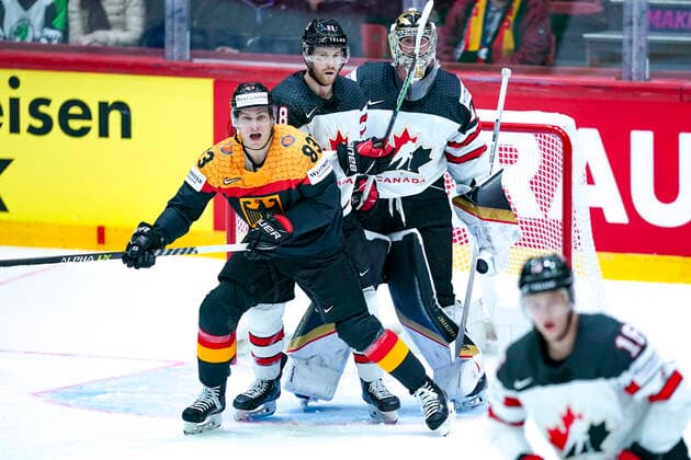 HELSINKI, FINLAND - MAY 13: Leonhard Pfoderl of Germany fights for position with Damon Severson of Canada during the 2022 IIHF Ice hockey, Eishockey World Championship, WM, Weltmeisterschaft match between Germany and Canada at Helsinki Ice Hall on May 13, 2022 in Helsinki, Finland. Helsinki Helsinki Ice Hall Uusimaa Finland Copyright: xJustPictures.ch JarixPestelaccix
