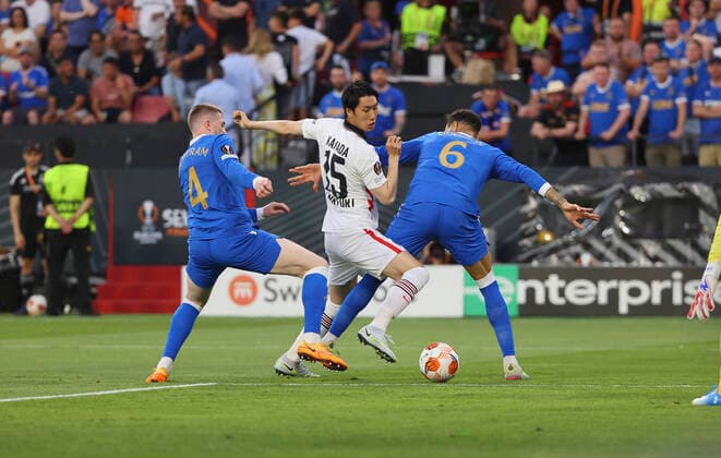 18.05.2022, Fussball UEFA Europa League Finale in Sevilla, Eintracht Frankfurt - Glasgow Rangers FC, emonline, emspor, v.l., John Lundstram (Glasgow Rangers FC), Daichi Kamada (Eintracht Frankfurt), Connor Goldson (Glasgow Rangers FC) DFL DFB REGULATIONS PROHIBIT ANY USE OF PHOTOGRAPHS AS IMAGE SEQUENCES AND OR QUASI-VIDEO. xdcx Copyright: HMBxMedia