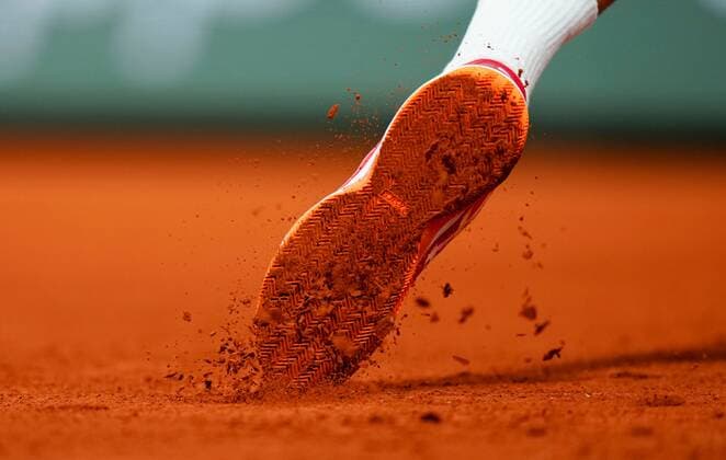 Mandatory Credit: Photo by Javier Garcia Shutterstock (12942467co) The Asics shoe of Novak Djokovic as he slides on the clay French Open Tennis, Friday Previews, Roland Garros, Paris, France - 20 May 2022 French Open Tennis, Friday Previews, Roland Garros, Paris, France - 20 May 2022  Copyright: xJavierxGarcia Shutterstockx 12942467co