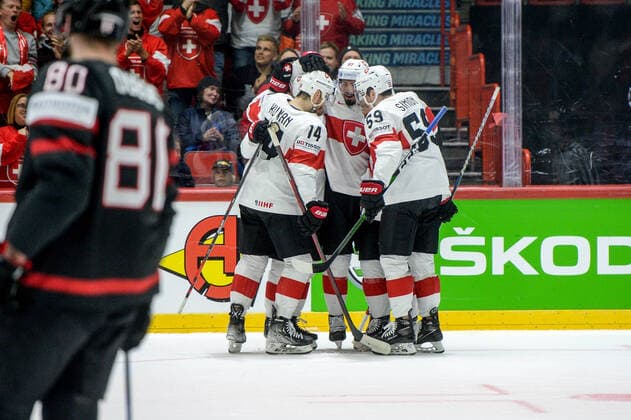 21.05.2022, Helsinki, Helsinki Ice Hall, 2022 IIHF Ice hockey, Eishockey World Championship, WM, Weltmeisterschaft Canada - Switzerland, Switzerland celebrate the 3:3 goal. From left: 14 Dean Kukan (Switzerland), scorer 97 Jonas Siegenthaler (Switzerland), 59 Dario Simion (Switzerland) Helsinki Helsinki Ice Hall Uusimaa Finland Copyright: xJustPictures.ch AndreaxBrancax