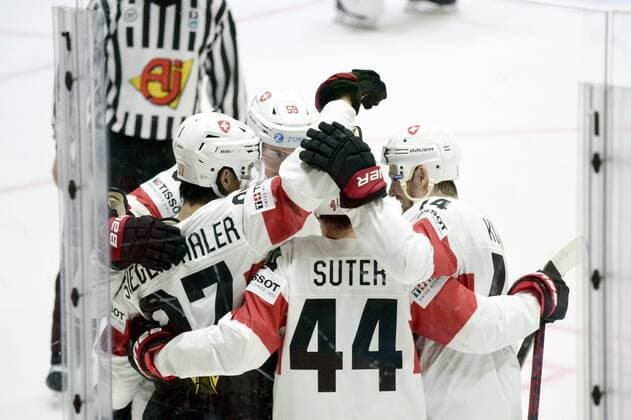 Players of Team Switzerland celebrate 3-3 equalizer by Jonas Siegenthaler during the 2022 IIHF Ice hockey, Eishockey World Championships preliminary round group A match between Canada and Switzerland in Helsinki on May 21, 2022. Helsinki Finland LKFTVX20220521172038ABDQ  Copyright: xMikkoxStigx