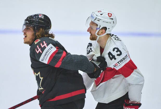 Maxime Comtois Nr. 44 of Canada fixes Andrea GLAUSER, SUI 43 in the match CANADA - SWITZERLAND 3-6 of the IIHF Ice hockey, Eishockey World Championship, WM, Weltmeisterschaft Group B in Helsinki, Finland, May 21, 2022, Season 2021 2022