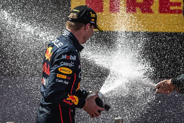 May 22, 2022, Barcelona, Catalonia, Spain: MAX VERSTAPPEN (NED) from team Red Bull sprays champagne as he celebrates his victory on the podium at Circuit de Barcelona Catalunya Barcelona Spain - ZUMAo105 20220522_zap_o105_017 Copyright: xMatthiasxOesterlex