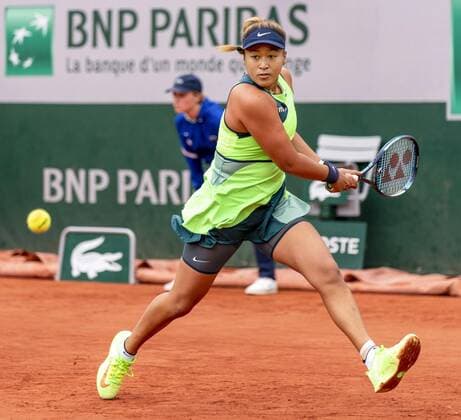 Tennis: French Open Naomi Osaka of Japan returns a shot to Amanda Anisimova of the United States during their first-round match at the French Open tennis tournament in Paris on May 23, 2022.  A14AA0001292772P