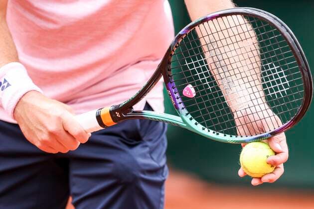 TENNIS - French Open 2022 PARIS,FRANCE,23.MAY.22 - TENNIS - ATP, Tennis Herren World Tour, French Open, Roland Garros, Grand Slam. Image shows a feature with a tennis racket and ball.  GEPAxpictures xPatrickxSteiner