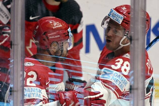 Markus Lauridsen (L) of Denmark celebrates his game opening goal with Morten Poulsen during the 2022 IIHF Ice hockey, Eishockey World Championships preliminary round group A match between Canada and Denmark in Helsinki on May 23, 2022. Helsinki Finland LKFTJK20220523204451MJDW  Copyright: xVesaxMoilanenx