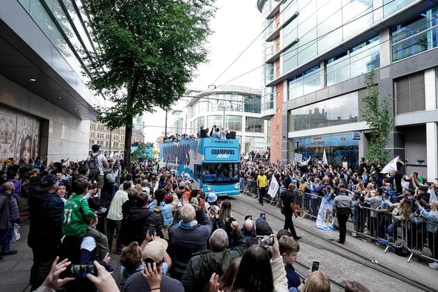 Mandatory Credit: Photo by Robbie Stephenson JMP Shutterstock (12953257an) Manchester City celebrate their Premier League title win during the open top bus parade Manchester City Champions Bus Parade, UK - 23 May 2022 EDITORIAL USE ONLY No use with unauthorised audio, video, data, fixture lists (outside the EU), club league logos or live services. Online in-match use limited to 45 images (+15 in extra time). No use to emulate moving images. No use in betting, games or single club league player publications services. Manchester City Champions Bus Parade, UK - 23 May 2022 EDITORIAL USE ONLY No use with unauthorised audio, video, data, fixture lists (outside the EU), club league logos or live services. Online in-match use limited to 45 images (+15 in extra time). No use to emulate moving images. No use in betting, games or Copyright: xRobbiexStephenson JMP Shutterstockx 12953257an