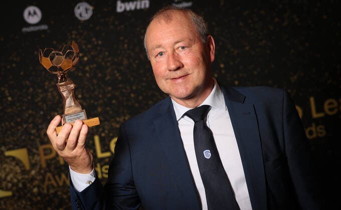 Genk team manager Pierre Denier poses for the photographer with a trophy for all his career during the Pro League Awards 2022, for the best players in the first (1A) and second (1B) divisions of the Belgian soccer championships, Monday 23 May 2022 in Brussels. VIRGINIExLEFOUR  x35427128x