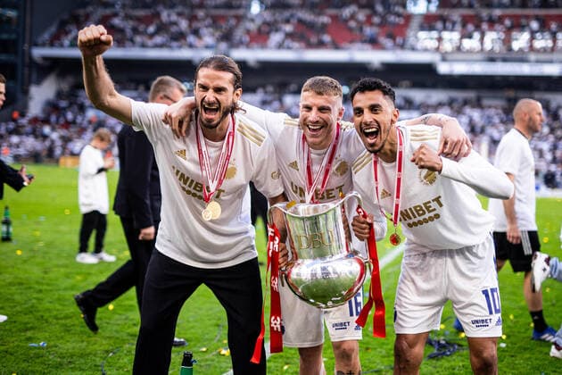 FC Copenhagen win the Danish Championship 2021-22, Copenhagen, Denmark Copenhagen, Denmark. 22nd, May 2022. (L-R) Marios Oikonomou, Pep Biel and Carlos Zeca of FC Copenhagen celebrate winning the Danish Superliga and the club s 14th championship title after the 3F Superliga match between FC Copenhagen and Aalborg Boldklub at Parken in Copenhagen. Kobenhavn Denmark  Copyright: xGonzalesxPhoto DejanxObretkovicx
