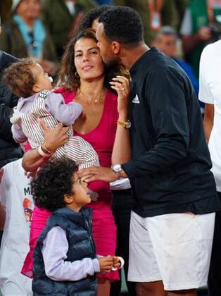 Mandatory Credit: Photo by Javier Garcia Shutterstock (12954043dk) Jo Wilfried Tsonga kisses his wife during the post match presentations French Open Tennis, Day 3, Roland Garros, Paris, France - 24 May 2022 French Open Tennis, Day 3, Roland Garros, Paris, France - 24 May 2022  Copyright: xJavierxGarcia Shutterstockx 12954043dk