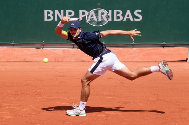 Gregoire Barrere of France plays against US John Isnerduring their French Tennis Open match at Roland Garros near Paris, France, on Wednesday, May 25, 2022. Isner won 6-4, 6-4, 3-6, 7-6.  PAR20220525108 MAYAxVIDON-WHITE