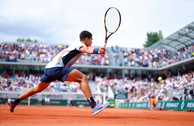 Mandatory Credit: Photo by Javier Garcia Shutterstock (12954376ai) Carlos Alcaraz in second round action French Open Tennis, Day 4, Roland Garros, Paris, France - 25 May 2022 French Open Tennis, Day 4, Roland Garros, Paris, France - 25 May 2022  Copyright: xJavierxGarcia Shutterstockx 12954376ai