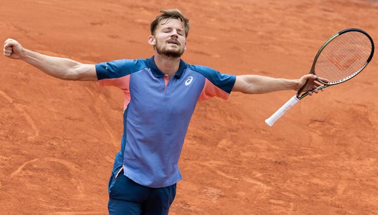 Belgian David Goffin spreads his arms as he celebrates winning a tennis match between Belgian Goffin ATP, Tennis Herren 48) and American Tiafoe (ATP 27), in the second round of the men s singles of the Roland Garros French Open tennis tournament, in Paris, France, Thursday 26 May 2022. This year s tournament takes place from 22 May to 5 June. BENOITxDOPPAGNE  x35520100x