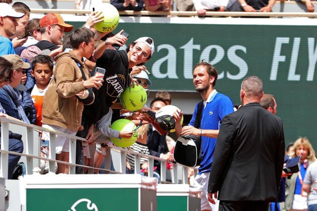 26th May 2022; Roland Garros, Paris, France: French Open Tennis tournament: Daniel Medvedev (Rus) gets a selfie with a fan  ActionPlus12393089 JonxBromley