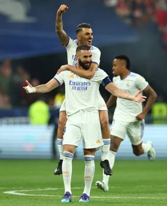 Paris, France, 28th May 2022. Karim Benzema and Dani Ceballos of Real Madrid celebrate after their team win the UEFA Champions League match at Stade de France, Paris. Picture credit should read: David Klein Sportimage EDITORIAL USE ONLY. No use with unauthorised audio, video, data, fixture lists, club league logos or live services. Online in-match use limited to 120 images, no video emulation. No use in betting, games or single club league player publications. SPI-1716-0137