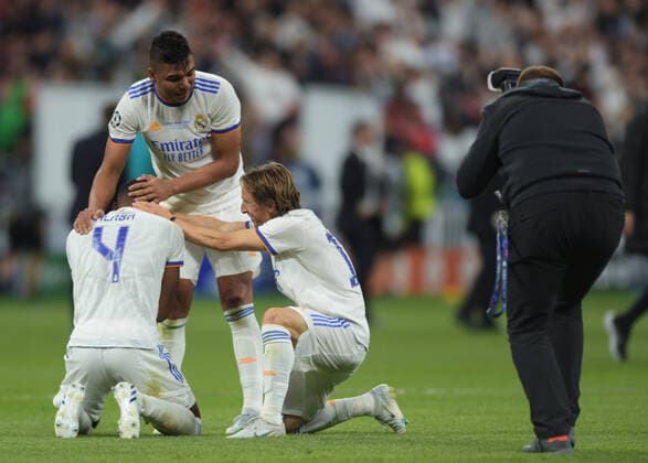Liverpool v Real Madrid UEFA Champions League David Alaba, Casemiro and Luka ModriÄ? of Real Madrid celebrate after victory in the UEFA Champions League Final between Liverpool and Real Madrid at Stade de France, Paris Content Not Available For UK Newspapers Copyright: xMattxWilkinsonx FIL-16950-0182 UK Newspapers OUT