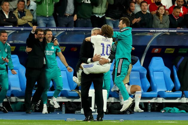 28th May 2022; Stade de France stadium, Saint-Denis, Paris, France. Champions League football final between Liverpool FC and Real Madrid; Real Madrid Manager Carlo Ancelotti celebrates with Luka Modric after they win the Champions League final  ActionPlus12394259 ShaunxBrooks
