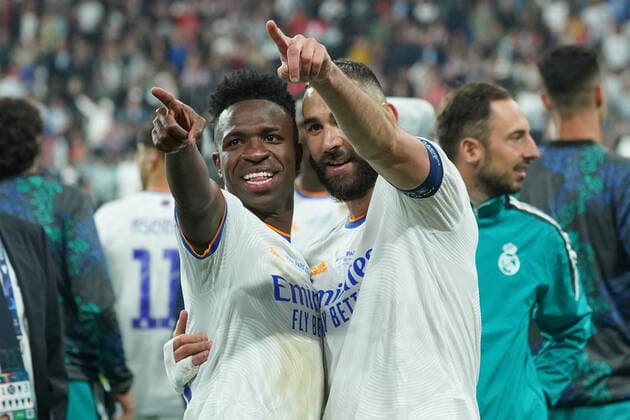 Vinicius Junior and Karim Benzema of Real Madrid CF celebrates after winning the UEFA Champions League Final match between Liverpool FC and Real Madrid CF at Stade de France on May 28, 2022 in Paris, France. Copyright: xGiuseppexMaffiax 32220220