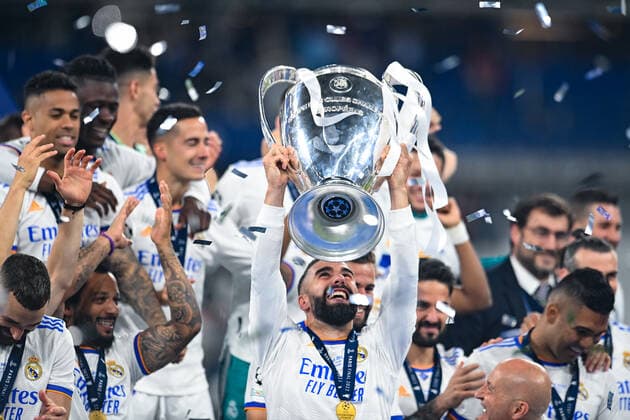 Football - 2021 2022 UEFA Champions League - Final - Real Madrid vs Liverpool - Stade de France, Paris - Saturday 28th May 2022 Real Madrid s defender Daniel Carvajal (2) lifts the Champions League Trophy 