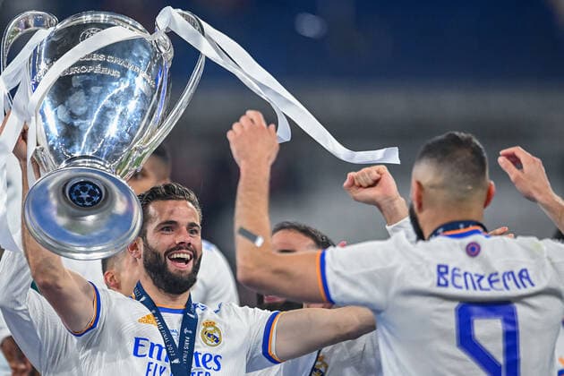 Football - 2021 2022 UEFA Champions League - Final - Real Madrid vs Liverpool - Stade de France, Paris - Saturday 28th May 2022 Real Madrid s defender Nacho Fernandez (6) holds the Champions league trophy 