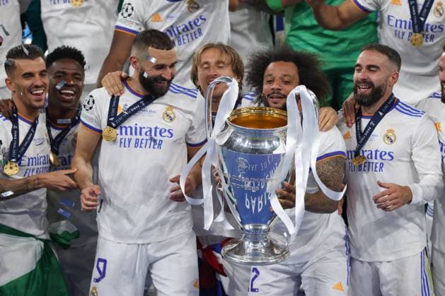 Paris, France, 28th May 2022. Marcelo of Real Madrid lifts the trophy as he celebrates with team mate following the 1-0 victory in the UEFA Champions League match at Stade de France, Paris. Picture credit should read: Jonathan Moscrop Sportimage EDITORIAL USE ONLY. No use with unauthorised audio, video, data, fixture lists, club league logos or live services. Online in-match use limited to 120 images, no video emulation. No use in betting, games or single club league player publications. SPI-1716-0213