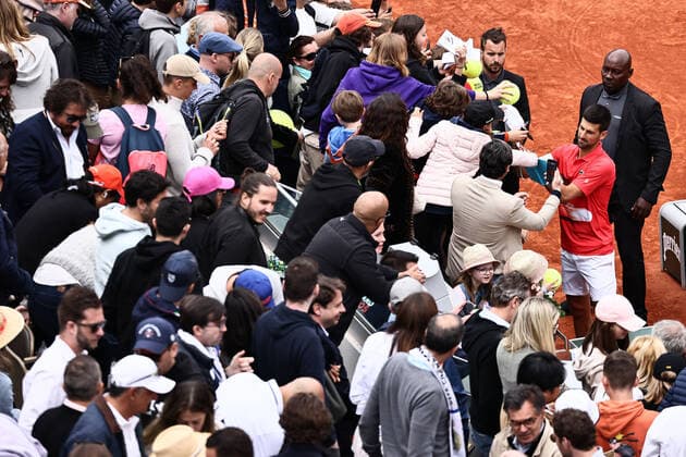 Novak Djokovic, SRB, signing autographs after fourth round of 2022 French Open at Roland Garros, Paris, 29 05 2022; -
