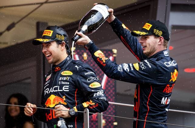 MONTE-CARLO - Sergio Perez (Red Bull Racing) and Max Verstappen (Red Bull Racing) on the podium after the F1 Grand Prix of Monaco at Circuit de Monaco on May 29, 2022 in Monte-Carlo, Monaco. REMKO DE WAAL F1 Grand Prix van Monaco, RACE 2022 xVIxANPxSportx xxANPxIVx
