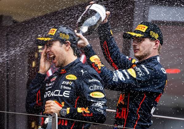 MONTE-CARLO - Sergio Perez (Red Bull Racing) and Max Verstappen (Red Bull Racing) on the podium after the F1 Grand Prix of Monaco at Circuit de Monaco on May 29, 2022 in Monte-Carlo, Monaco. REMKO DE WAAL F1 Grand Prix van Monaco, RACE 2022 xVIxANPxSportx xxANPxIVx