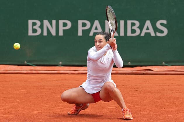 29th May 2022; Roland Garros, Paris, France: French Open Tennis tournament: Martina Trevisan (ITA) gets down low to return to Aliaksandra Sasnovich  ActionPlus12394590 JonxBromley