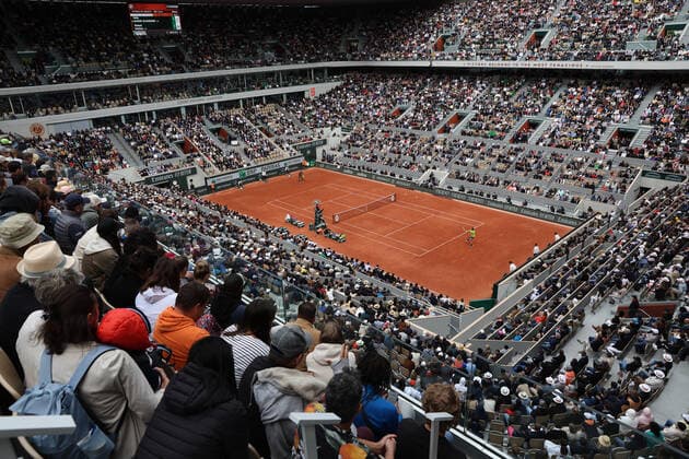 Visitors crowd the central court at Roland Garros during the French Tennis Open match between Spanish Rafael Nadal and Canadian Felix Auger-Aliassime, near Paris, France, on Sunday May 29, 2022.  PAR20220529126 MAYAxVIDON-WHITE