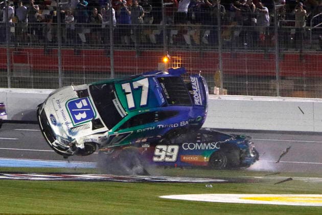 Sport Themen der Woche KW22 Sport Bilder des Tages CHARLOTTE, NC - MAY 29: Chris Buescher ( 17 RFK Racing Fifth Third Bank Ford) gets airborne on the frontstretch involving Daniel Suarez ( 99 TrackHouse Racing CommScope Chevrolet) during the running of the NASCAR, Motorsport, USA Cup Series Coca-Cola 600 on May 29, 2022 at Charlotte Motor Speedway in Charlotte, NC. (Photo by Jeff Robinson Icon Sportswire) AUTO: MAY 29 NASCAR Cup Series Coca-Cola 600 Icon2205292758600