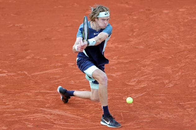 30th May 2022; Roland Garros, Paris, France: French Open Tennis tournament: Andrey Rublev plays a backhand pass to Jannik Sinner (ITA)  ActionPlus12395305 JonxBromley
