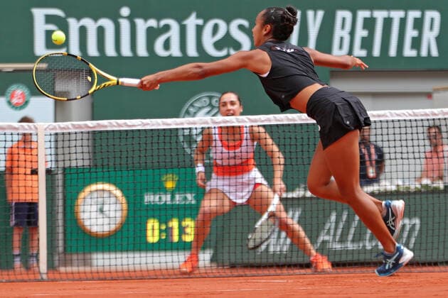 31st May 2022; Roland Garros, Paris, France: French Open Tennis tournament: Leylah Fernandez (CAN) stretches at the net against Martina Trevisan (ITA)  ActionPlus12395326 JonxBromley