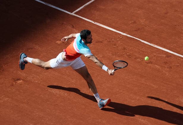 Marin Cilic of Bosnia-Herzegovina plays against Russian Andrey Rublev during their French Open tennis quarter final match at Roland Garros near Paris, France, on Wednesday, June 1, 2022.  PAR20220601126 MAYAxVIDON-WHITE