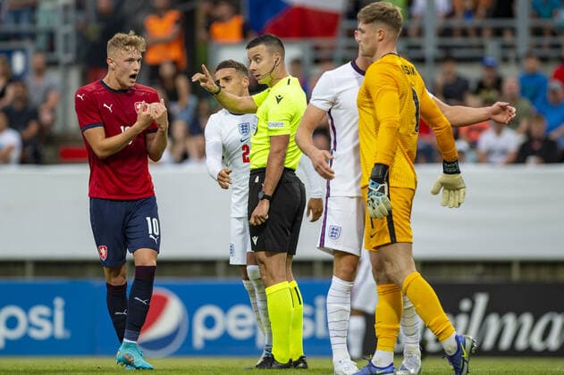 From left Czech Adam Karabec speaks with referee Milos Milanovic during the 2023 UEFA European Under-21 Championship qualification Group G: Czech Republic vs. England in Ceske Budejovice, Czech Republic, June 3, 2022. (CTKxPhoto VaclavxPancer) CTKPhotoP2022060308349  VPC_0004