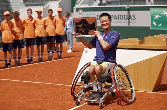 Mandatory Credit: Photo by Ella Ling Shutterstock (12959953be) Shingo Kunieda of Japan with the trophy French Open Tennis, Day 14, Roland Garros, Paris, France - 04 Jun 2022 French Open Tennis, Day 14, Roland Garros, Paris, France - 04 Jun 2022  Copyright: xEllaxLing Shutterstockx 12959953be