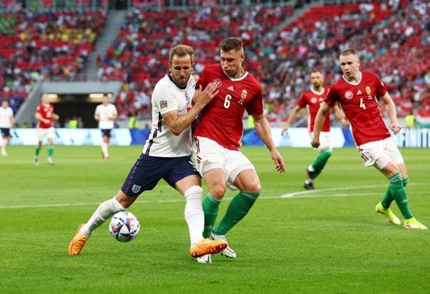Budapest, Hungary, 4th June 2022. Harry Kane of England tussles with Willi Orban of Hungary during the UEFA Nations League match at Puskas Arena, Budapest. Picture credit should read: David Klein Sportimage EDITORIAL USE ONLY. No use with unauthorised audio, video, data, fixture lists, club league logos or live services. Online in-match use limited to 120 images, no video emulation. No use in betting, games or single club league player publications. SPI-1726-0103