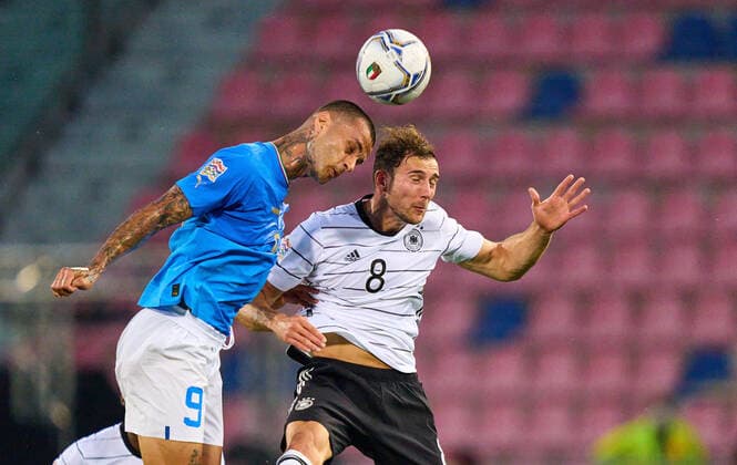 Leon Goretzka, DFB 8 compete for the ball, tackling, duel, header, zweikampf, action, fight against Gianluca Scamacca, ITA 9 in the UEFA Nations League 2022 match ITALY - GERMANY in Season 2022 2023 on Juni 04, 2022 in Bologna, Italy.