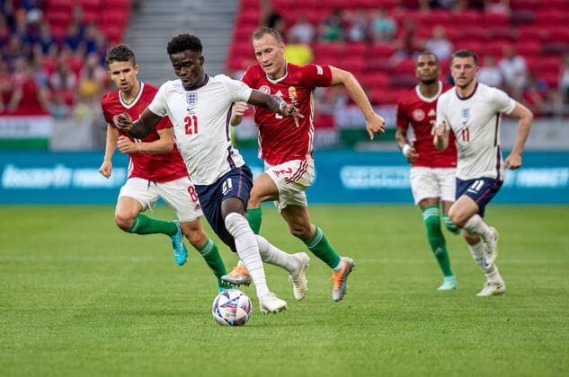 Hungary v England: UEFA Nations League - League Path Group 3 Bukayo Saka of England competes for the ball with Adam Lang of Hungary during the UEFA Nations League A3 match at Puskas ArÃ na on June 04, 2022 in Budapest, Hungary. Budapest Hungary  Copyright: xRobertxSzaniszlox originalFilename:szaniszlo-notitle220604_npUpz.jpg