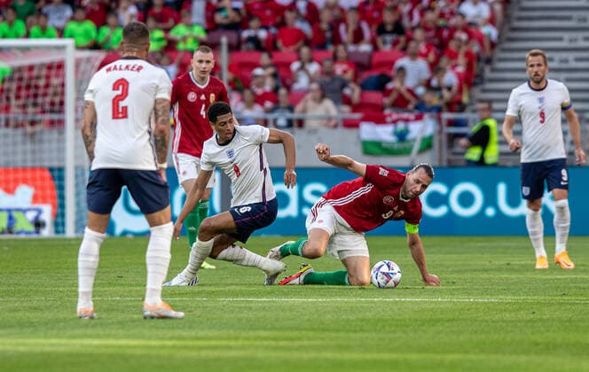 Hungary v England: UEFA Nations League - League Path Group 3 Adam Szalai of Hungary competes for the ball with Jude Bellingham of England during the UEFA Nations League A3 match at Puskas ArÃ na on June 04, 2022 in Budapest, Hungary. Budapest Hungary  Copyright: xRobertxSzaniszlox originalFilename:szaniszlo-notitle220604_np1SL.jpg