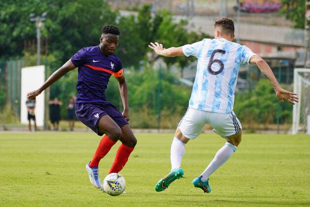 Lucien Agoume (France) - Franco Carboni (Argentine) FOOTBALL : France U20 vs Argentine U20 - Tournoi Maurice Revello - Aubagne - 04 06 2022 NorbertScanella Panoramic 