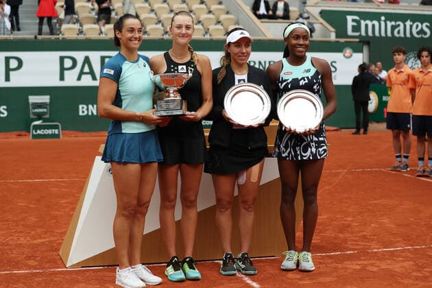 (220605) -- PARIS, June 5, 2022 -- Caroline Garcia Kristina Mladenovic of France and Jessica Pegula Coco Gauff of the United States (from L to R) take photos during the awarding ceremony after their women s doubles final at the French Open tennis tournament at Roland Garros in Paris, France, June 5, 2022. ) (SP)FRANCE-PARIS-TENNIS-ROLAND GARROS-FRENCH OPEN-WOMEN S DOUBLES FINAL GaoxJing 
