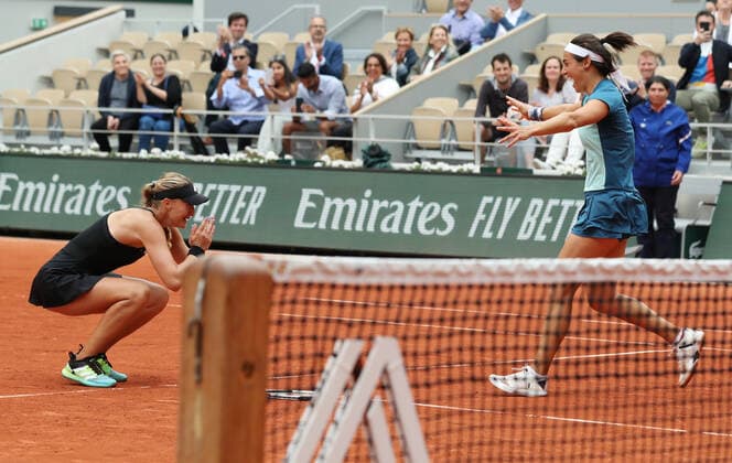 (220605) -- PARIS, June 5, 2022 -- Kristina Mladenovic (L) Caroline Garcia of France celebrate their victory after the women s doubles final against Coco Gauff Jessica Pegula of the United States at the French Open tennis tournament at Roland Garros in Paris, France, June 5, 2022. ) (SP)FRANCE-PARIS-TENNIS-ROLAND GARROS-FRENCH OPEN-WOMEN S DOUBLES FINAL GaoxJing 