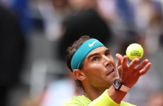 (220605) -- PARIS, June 5, 2022 -- Rafael Nadal of Spain serves during the men s singles final against Casper Ruud of Norway at the French Open tennis tournament at Roland Garros in Paris, France, June 5, 2022. ) (SP)FRANCE-PARIS-TENNIS-ROLAND GARROS-FRENCH OPEN-MEN S SINGLES-FINAL GaoxJing 
