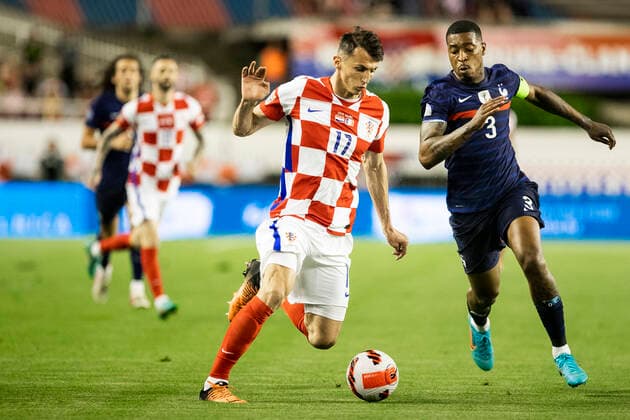 Croatia v France: UEFA Nations League - League Path Group 1 SPLIT, CROATIA - JUNE 06: Ante Budimir of Croatia compete for the ball with Presnel Kimpembe of France during the UEFA Nations League League A Group 1 match between Croatia and France at Stadion Poljud on June 6, 2022 in Split, Croatia. MilanxSabic PIXSELL