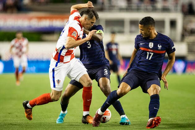 Croatia v France: UEFA Nations League - League Path Group 1 SPLIT, CROATIA - JUNE 06: Ante Budimir of Croatia compete for the ball with Presnel Kimpembe and William Saliba of France during the UEFA Nations League League A Group 1 match between Croatia and France at Stadion Poljud on June 6, 2022 in Split, Croatia. MilanxSabic PIXSELL