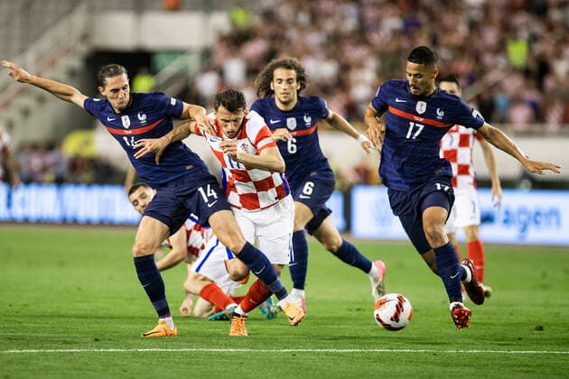 Croatia v France: UEFA Nations League - League Path Group 1 SPLIT, CROATIA - JUNE 06: Ante Budimir of Croatia competes for a ball with Adrien Rabiot (L) and William Saliba (R) of France during the UEFA Nations League League A Group 1 match between Croatia and France at Stadion Poljud on June 6, 2022 in Split, Croatia. MilanxSabic PIXSELL