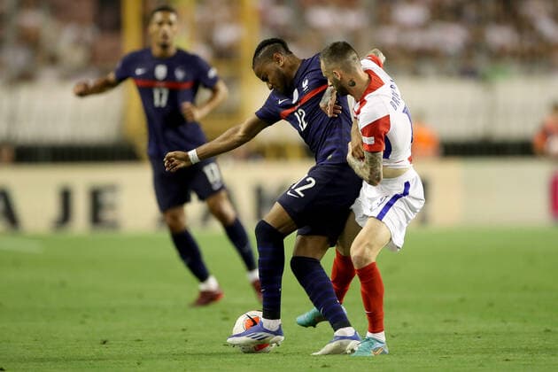 Croatia v France: UEFA Nations League - League Path Group 1 SPLIT, CROATIA - JUNE 06: Christopher Nkunku of France competes for a ball with Marcelo Brozovic of Croatia during the UEFA Nations League League A Group 1 match between Croatia and France at Stadion Poljud on June 6, 2022 in Split, Croatia. IgorxKralj PIXSELL